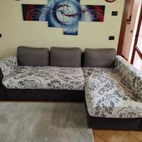 Divano letto con penisola e contenitore