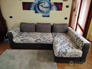 Divano letto con penisola e contenitore