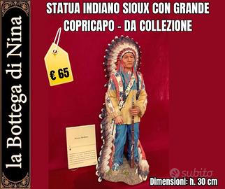 Statua indiano Sioux con copricapo di piume