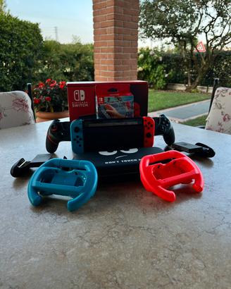 Nintendo Switch + Nintendo sports + accessori