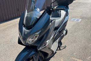 Suzuki Burgman - perfette condizioni.
