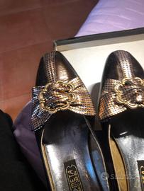 Scarpe eleganti di croma