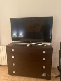 Letto matrimoniale con due cassettiere