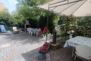 SETTEMBRE, casa con giardino privato
