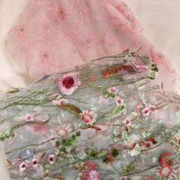 Stock di tessuto tulle ricamato