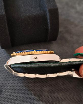 Orologio automatico  sub acciaio e oro 
