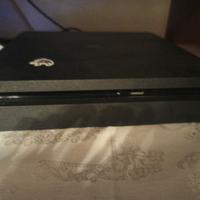 PlayStation 4 PS4 con giochi e joystick 