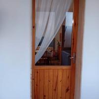 Tre finestre e due porta finestra in legno