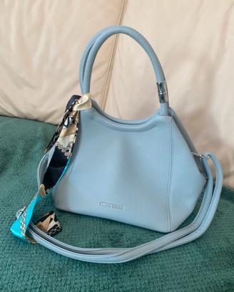 Borsa sweet years azzurro pastello con fiocchetto.