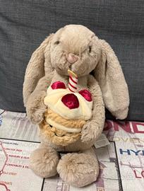 Peluche coniglio con torta Jellycat