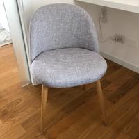 Sedia in stoffa colore grigio