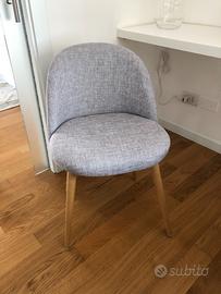 Sedia in stoffa colore grigio