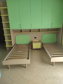 armadio a ponte con letti e comodino 