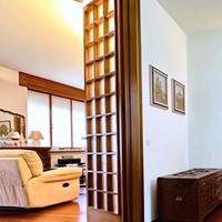 Doppia porta in legno massello e riquadri in vetro