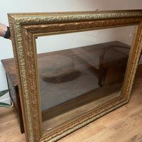 Grande cornice dorata in legno massello con vetro