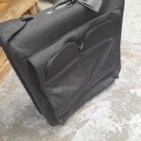 Set valigie TUMI - Valigia + borsa + porta abiti