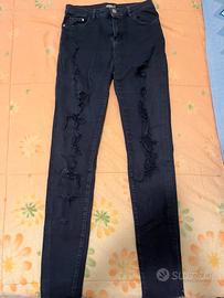 Jeans nero strappato