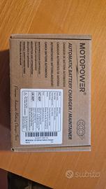 Caricatore e mantenitore