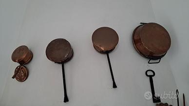 Pentole in rame di diverse misure