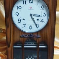 orologio a pendolo in legno