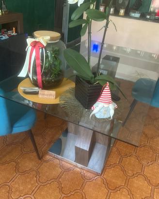 tavolo in vetro con sedie