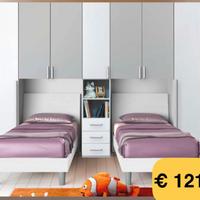 Cameretta con 2 letti singoli e armadio integrato