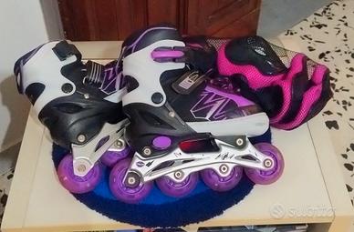 Pattini bambina regolabili 31/34 + kit protezioni 