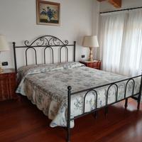 Letto matrimoniale in ferro battuto marca Cosatto