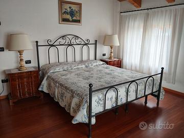 Letto matrimoniale in ferro battuto marca Cosatto