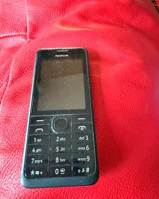 NOKIA 301  3.2 MP  Cuffie+ Carica batterie