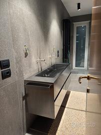 Lavandino di design rivestito in acciaio inox