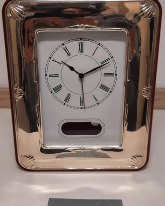 orologio a pendolo in argento 