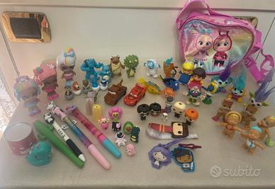 56 pezzi collezioni varie + borsetta omaggio