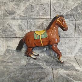cavallino in latta a molla