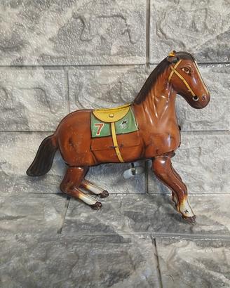 cavallino in latta a molla