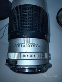 Obbiettivo  135 mm M 42 + adattatore EF Canon