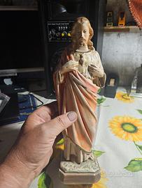 statua 