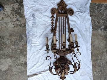 Antica applique a forma di lira