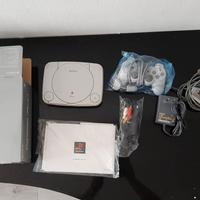 Play Station One + Pistola e Memory cards
