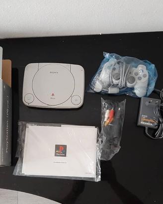 Play Station One + Pistola e Memory cards