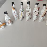 stock 8 statuine suonatrici