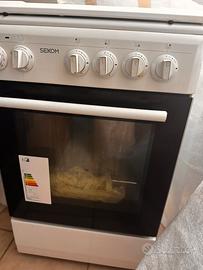 Cucina a gas + forno elettrico