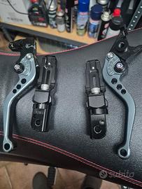 leve frizione/freno e pedane posteriori
