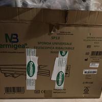 Sponda telescopica universale per letto.