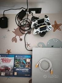 Ps4 Slim + 2 giochi + 2 joypad e + 2 giochi