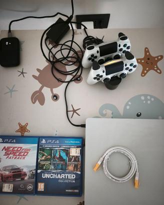 Ps4 Slim + 2 giochi + 2 joypad e + 2 giochi