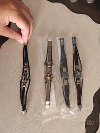 4 bracciali in cuoio metallo