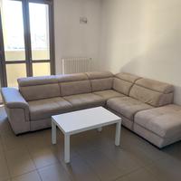 Divano letto con penisola apribile