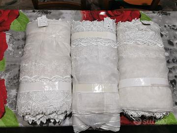 Rotoli di organza ricamata