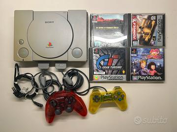Sony Playstation 1 • 2 Controller • 4 Giochi